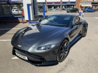 A grey Aston Martin with graphene coating finished by New Again.