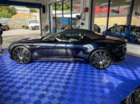 Blue Aston Martin with paintwork restored and highly polished. Finished with a ceramic coating.