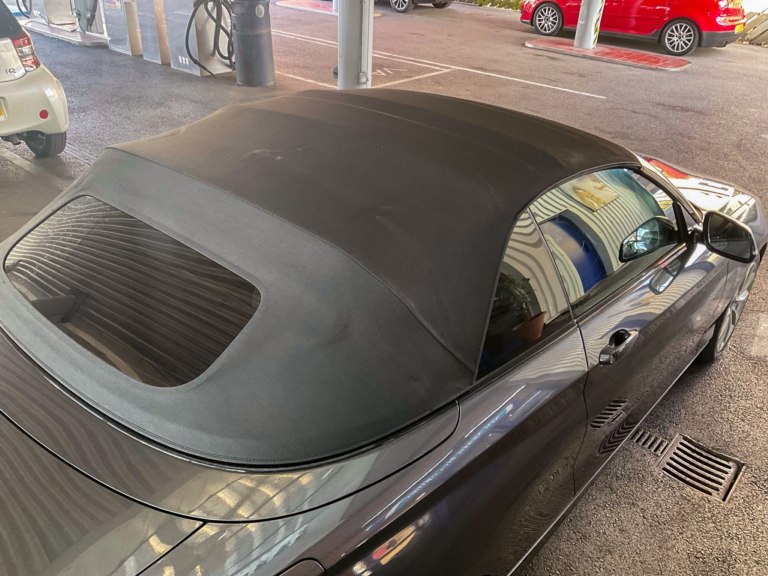 Wear marks on a soft top convertible roof after treatment.