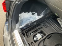 Paint spillage in boot of car.