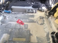 Spilled paint in the floorpan of ca car.