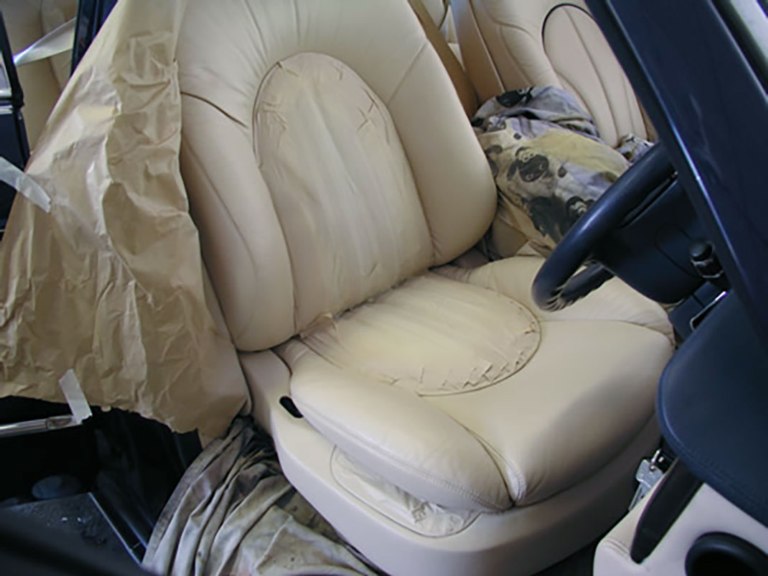 Leather seat masked up for painting