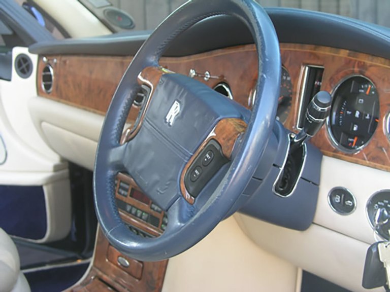 Worn leather steering wheel