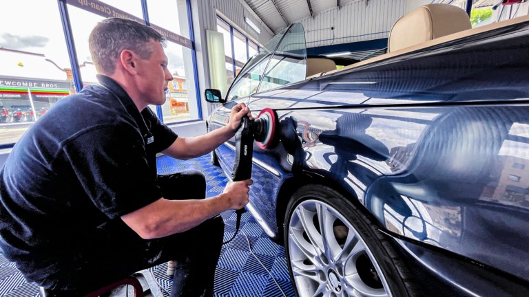 James polishes a BMW until it shines like new