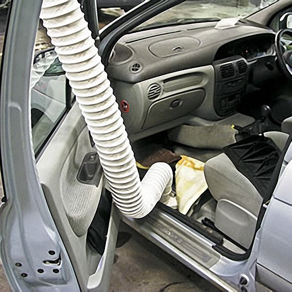 Extracting water from a flooded car footwell