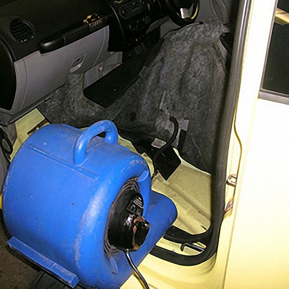 Dehumidifier extracting moisture from car