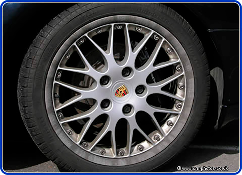 Porsche wheel corroded.