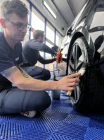 Matt applying tyre sheen.