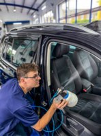 Odour removal service - fogging a car with disinfectant. 