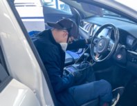 Matt inspecting a rodent contaminated car.