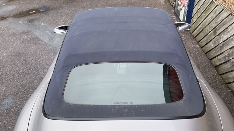 Porsche convertible roof before cleaning.